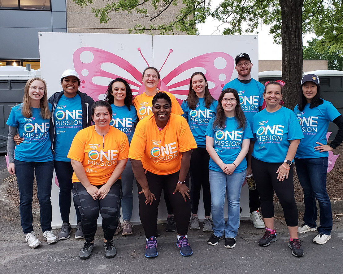 A group of smiling volunteers