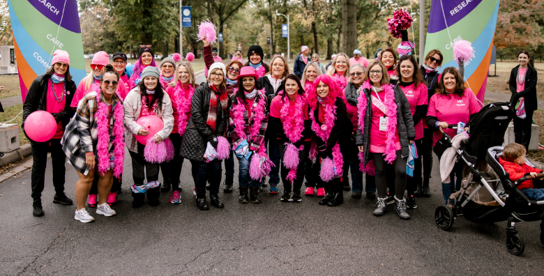 Large group of team members posing at a Komen event