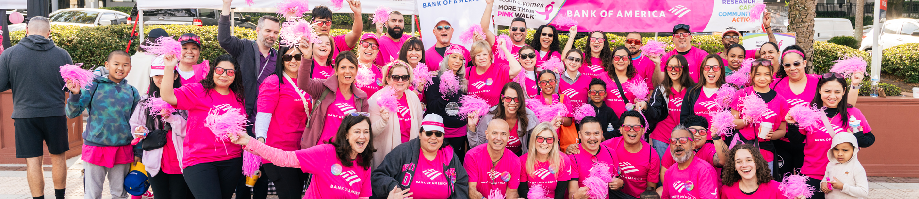 Large group of team members posing at a Komen event