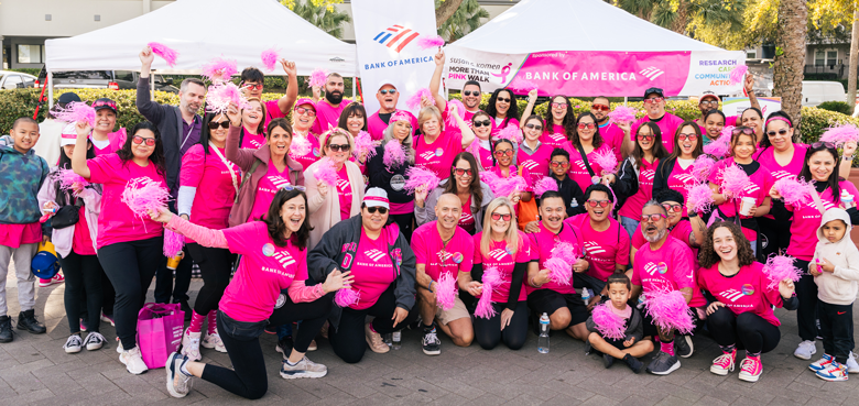 Large group of team members posing at a Komen event