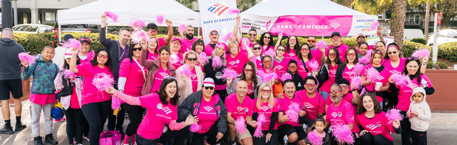 Large group of team members posing at a Komen event