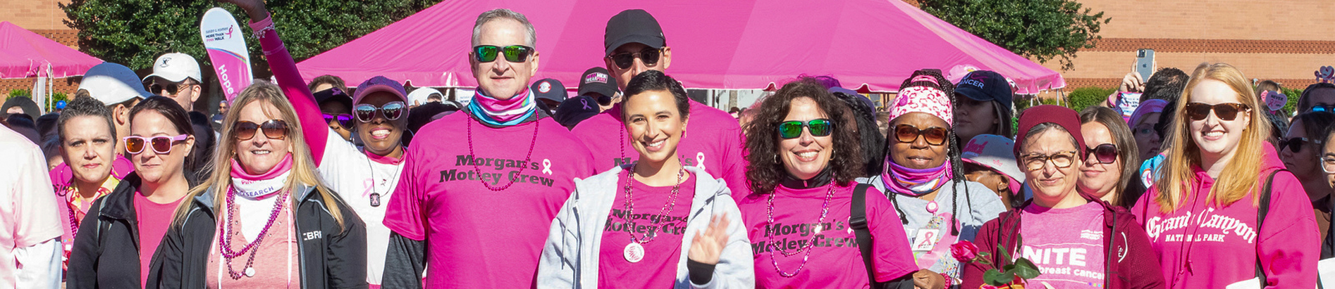 Large group of team members posing at a Komen event