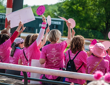 Survivors waiving signs