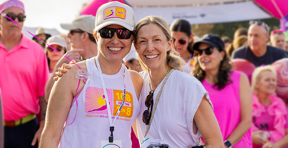 Austin women in white, smiling during More Than Pink Walk